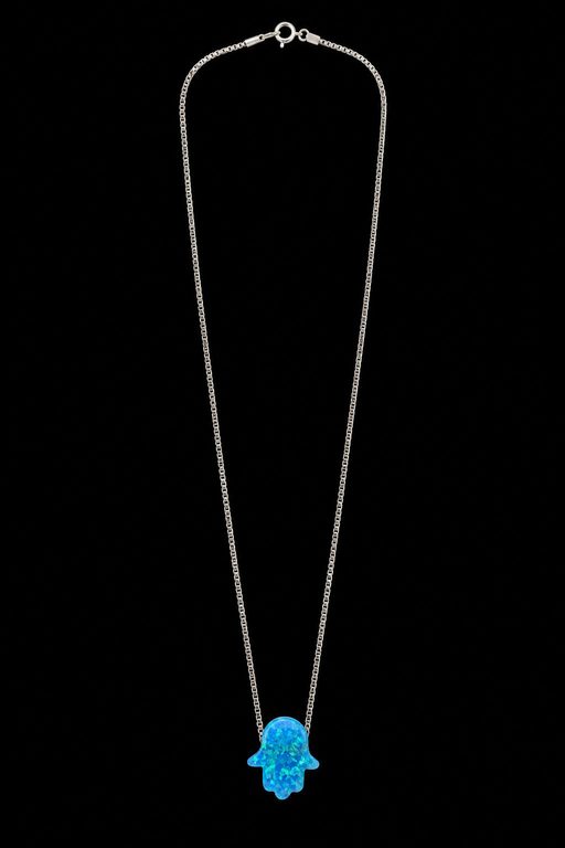 Collar con dije de Hamsa azul · fotografía de registro